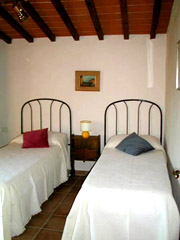 Florence Vacances: Chambre  coucher avec deux lits individuels de l'Appartement Loggia