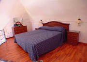 Apartment Urlaub Positano: Schlafzimmer auf der Hngebodenetage des Apartments Ludovica Typ C in Positano